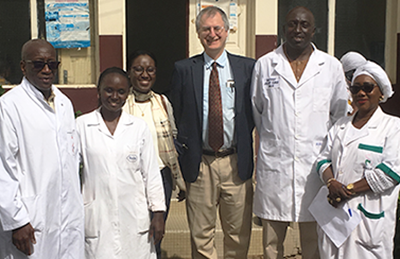 Dr. Khadidjatou Kane and Dr. Eric Krakauer of the HMS Program in Global Palliative care meet with Senegalese partners led by Dr. Mamadou Diop, Professor of Medicine at the Université Cheikh Anta Diop and Director of Senegal’s main cancer center.