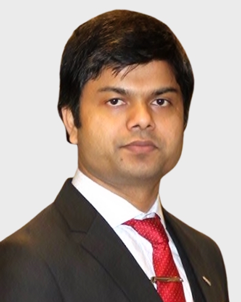 photo of Md. Aminul Islam, black jacket, red tie