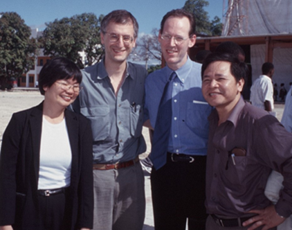 Dr. Paul Farmer (1959-2022) welcomes Dr. Eric Krakauer and two Vietnamese colleagues, Dr. Ngo Thi Kim Cuc and Dr. Tran Khac Dien, for a study tour of Partners In Health sites in Haiti, 2003.