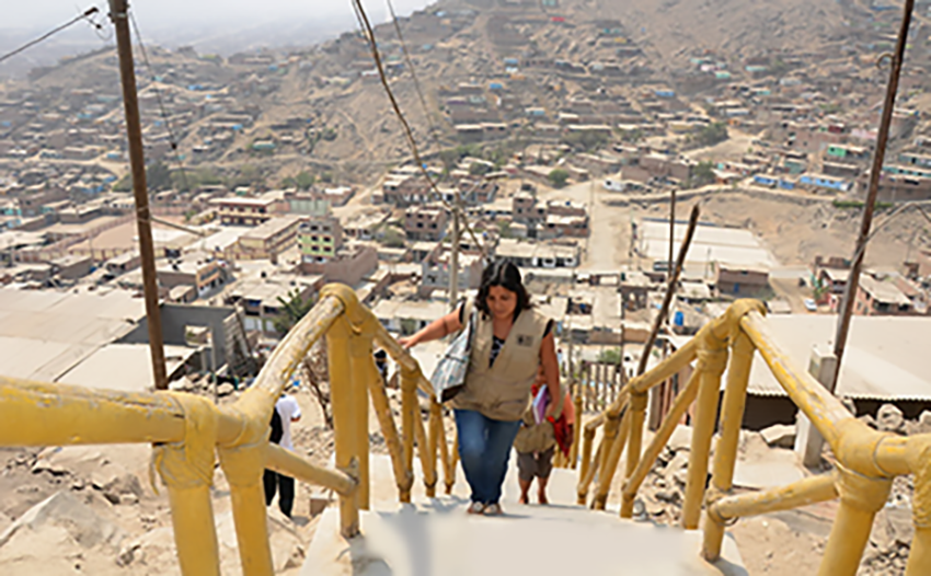 A mental health worker goes to visit patients in Carabayllo, Peru