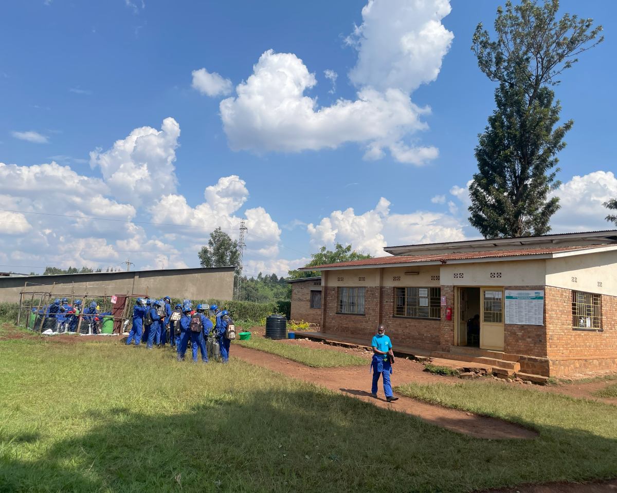 A day in the field. In picture are Community Health Workers in their dark blue gowns. They are from Nyamirama sector of rural Eastern Rwanda and had just completed their periodic indoor residual spraying with mosquito repellents. 