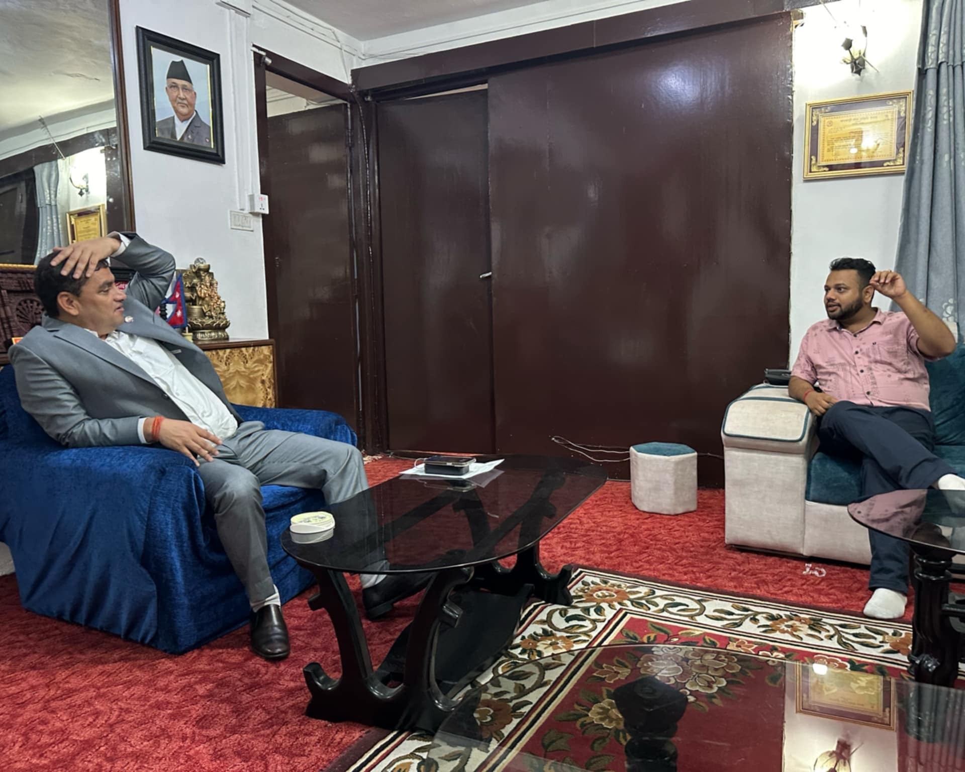 Pradish Poudel updating Health Minister about the recent learning from the field study. 