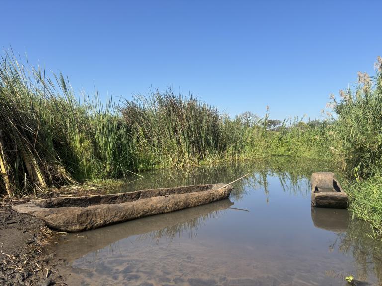 River in Malawi with simple boats
