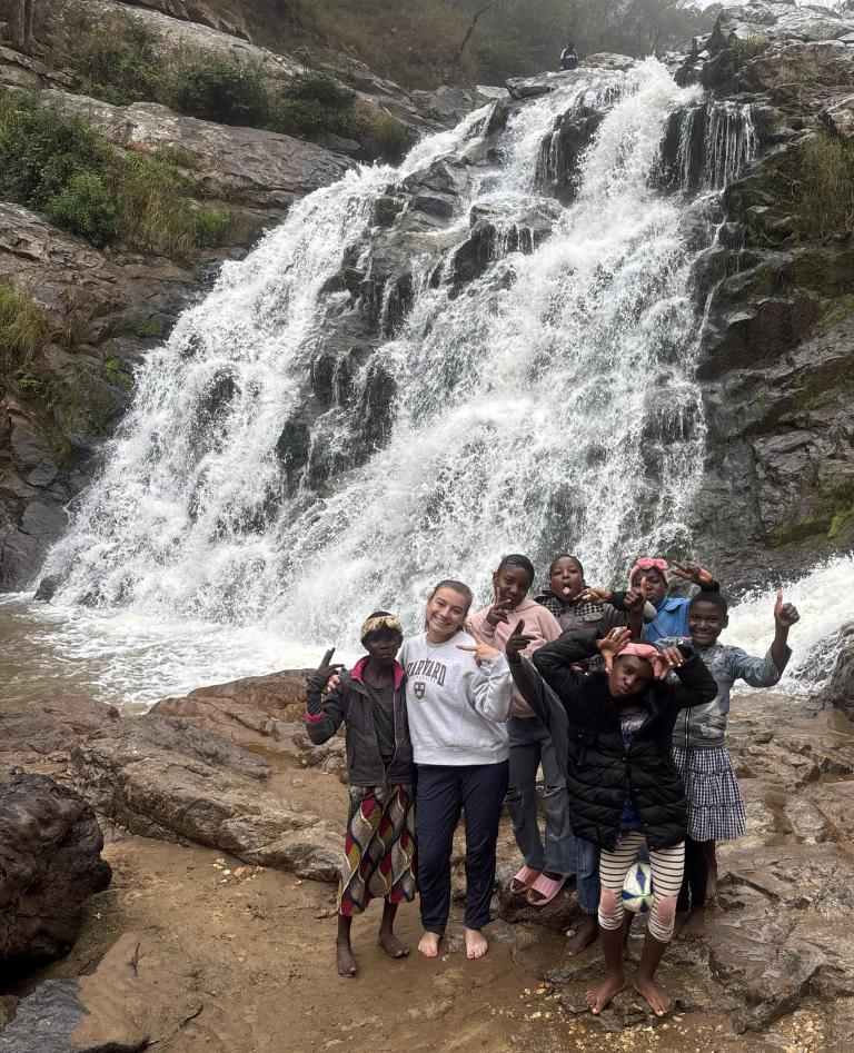 People at a waterfall