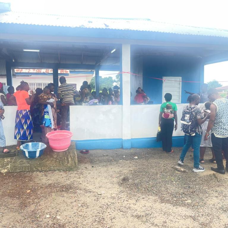 Group of people in an outside clinic