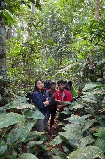 Indonesia team hiking in forest