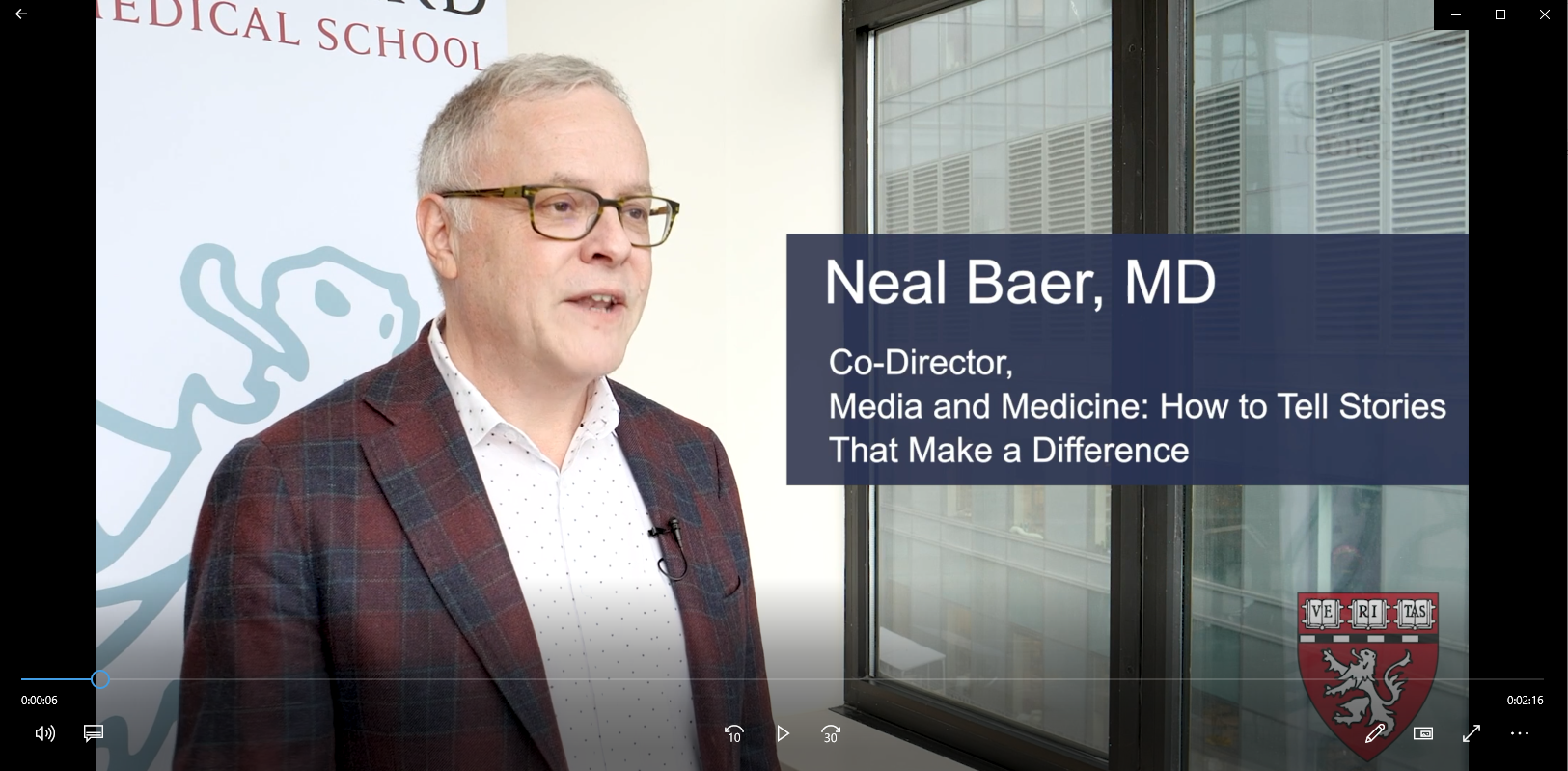 Photo of Neal Baer introducing YouTube Promo Video